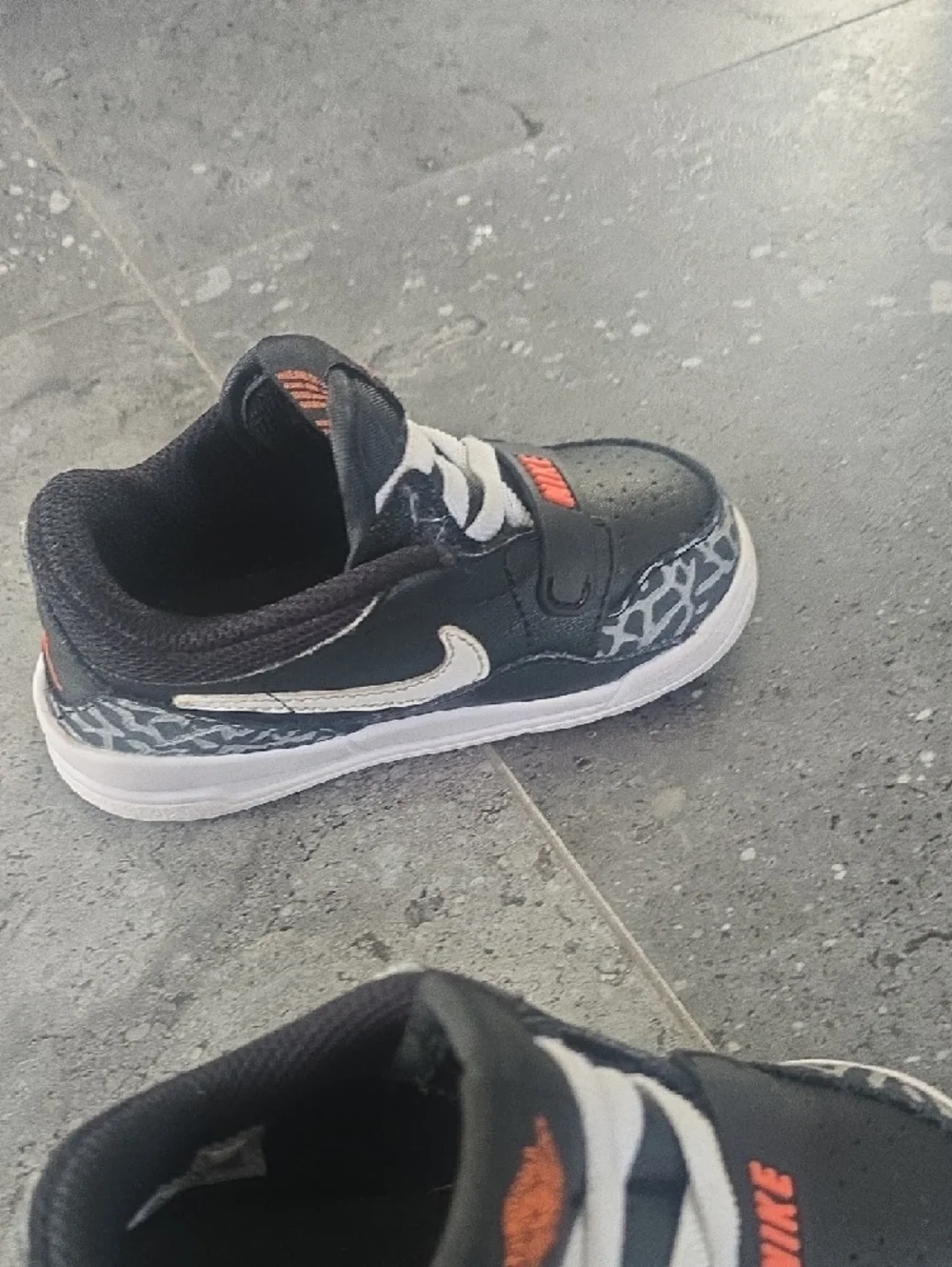 Nike Kids Black Sneakers with White Laces and Orange Logos - Picture 9 of 10